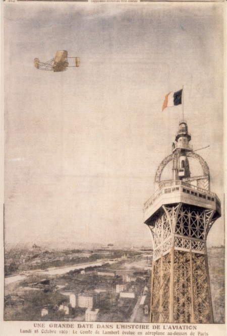 Charles de Lambert flying over the Eiffel Tower in an airplane
